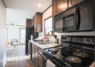 Model kitchen at Aldea Manufactured Home Community in Fort Worth, Texas